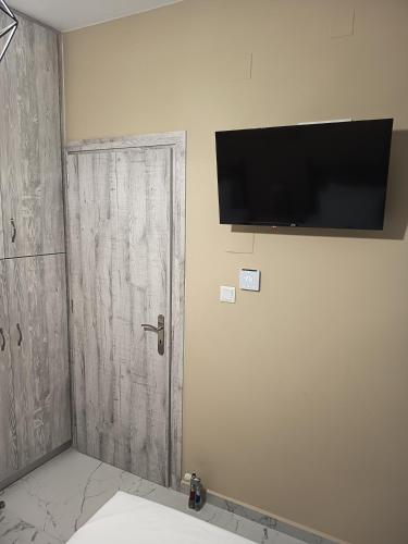 TV a/nebo společenská místnost v ubytování Sirius House