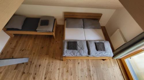 an overhead view of a bedroom with two bunk beds at U Bobra sjezdaře in Dolní Morava