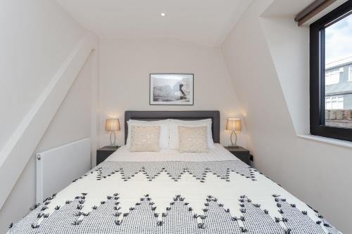 Voodi või voodid majutusasutuse Cleveland Residences Farringdon toas