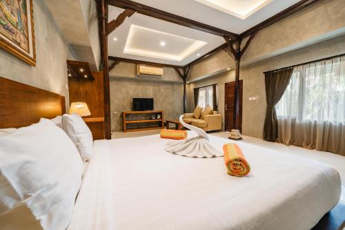 Uma Mani Villa Jimbaranにあるベッド