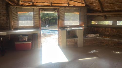an inside view of a room with a building with windows at VillaDelux in Pretoria
