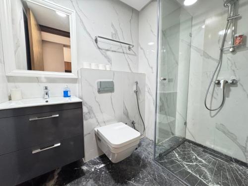 Koupelna v ubytování Élégant Studio Neuf Quartier 2 Mars Sécurisé