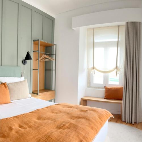 Postel nebo postele na pokoji v ubytování Live Sintra Boutique Guest House