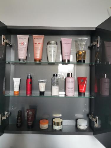 a shelf with a bunch of products on it at No.3 in Cardiff