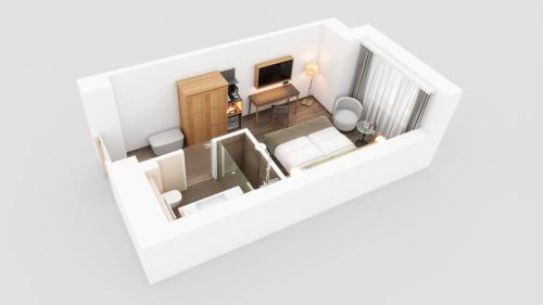 a rendering of a living room and dining room at Hotel IMLAUER & Bräu in Salzburg