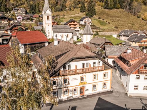 an aerial view of a town with a church at Apartment Sophia by Interhome in Sankt Martin