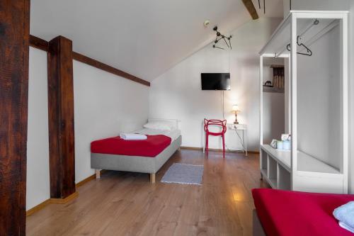 Ένα ή περισσότερα κρεβάτια σε δωμάτιο στο Hostel Starówka