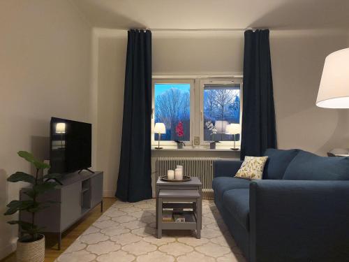 TV a/nebo společenská místnost v ubytování Prinshöjden Hotel - Smart Digital Apartments & Villas