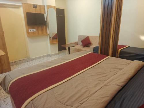 TV a/nebo společenská místnost v ubytování Grand Inn