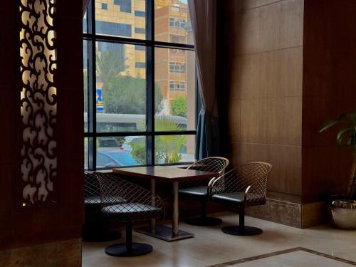 Un lugar para sentarse en Afraa Hotel Al Aziziya