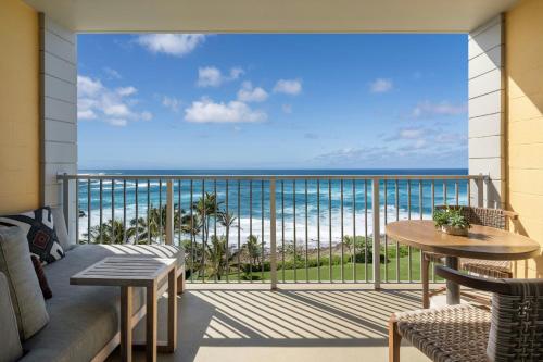 a balcony with a view of the ocean at The Ritz-Carlton O'ahu, Turtle Bay in Kahuku