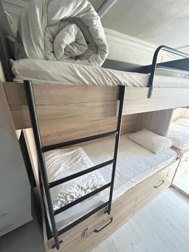 two sets of bunk beds in a room at 3 rooms studios in Istanbul