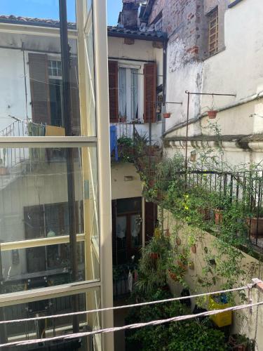 a view of a building from a window at COZY Place 26 in Vercelli
