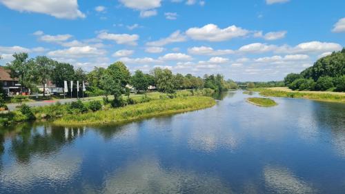 a view of a river from a bridge at Neues Ruhrtal Apartment 2 in Wickede (Ruhr)