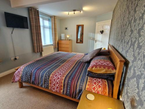 Postel nebo postele na pokoji v ubytování Swift Host - Owl Barn - Sleeps 2 - EV Charger - Pet Friendly