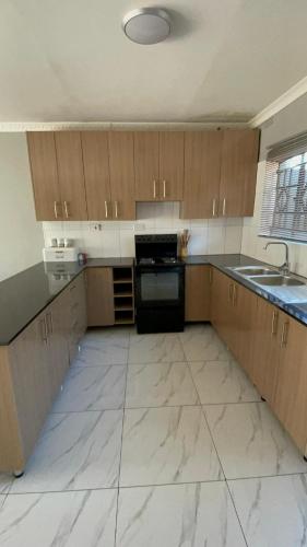 Dapur atau dapur kecil di Terra Vista Apartments
