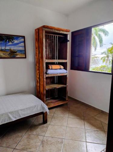 Postel nebo postele na pokoji v ubytování Suites Brilho do Sol