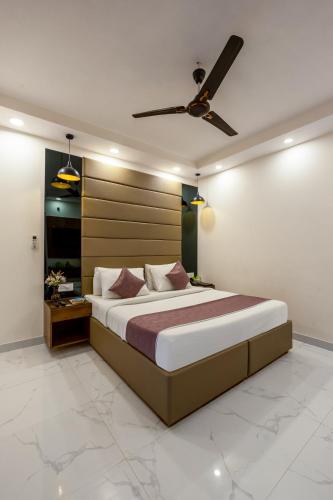 PK Boutique Hotel Noida Expresswayにあるベッド