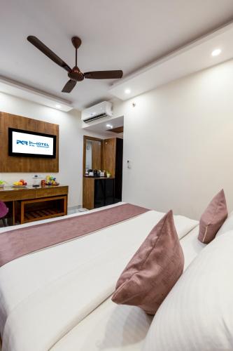 PK Boutique Hotel Noida Expresswayにあるベッド