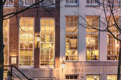 a building with large windows on the side of it at Ambassade Hotel in Amsterdam