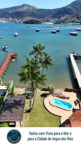 a view of a large body of water with boats at Casa das Tartarugas in Angra dos Reis