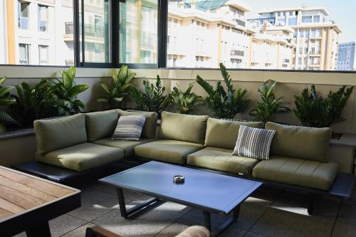 Posezení v ubytování STYLO Residences & Suites