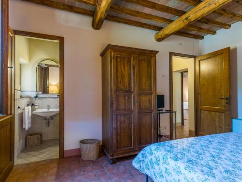 Katil atau katil-katil dalam bilik di Holiday Home Podere San Giuseppe-1 by Interhome