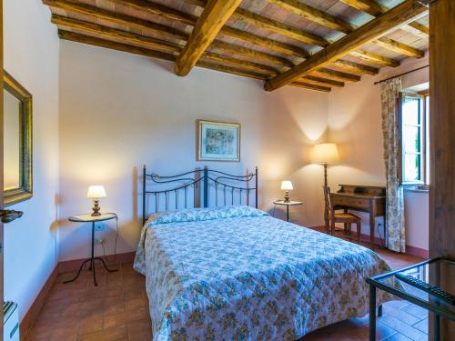 Katil atau katil-katil dalam bilik di Holiday Home Podere San Giuseppe-1 by Interhome