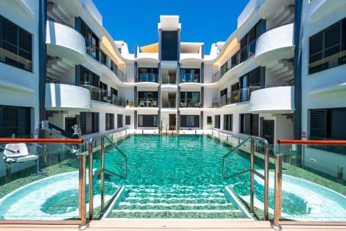 NEW stylish beachside 2BR with pool and garage