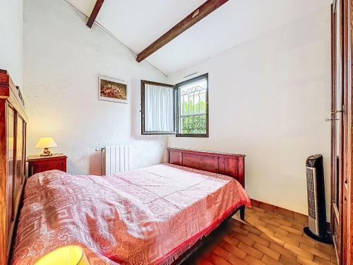 Katil atau katil-katil dalam bilik di Holiday Home Les Maisons de la Plage-14 by Interhome