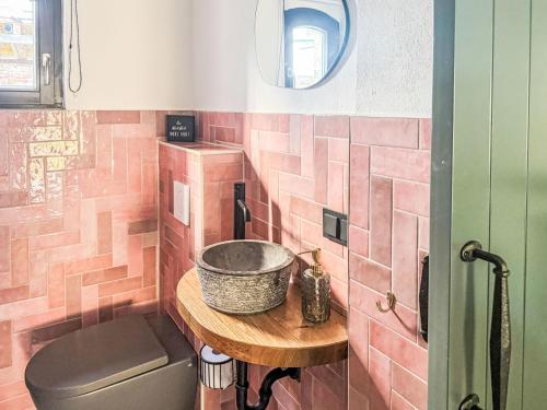 a bathroom with a sink and a toilet at Apartment Hinterhov Nest by Interhome in Beeskow