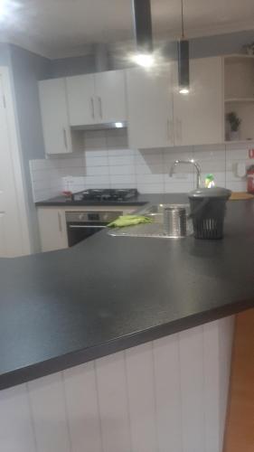 Una cocina o cocineta en Tia Margarita