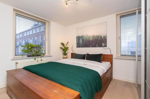 Ένα ή περισσότερα κρεβάτια σε δωμάτιο στο Zaan City Deck