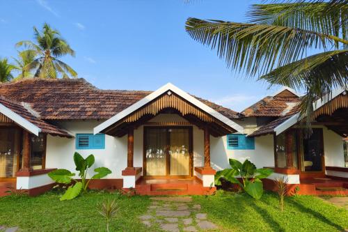 Zahrada ubytování Aavi beach retreat, Nileshwar