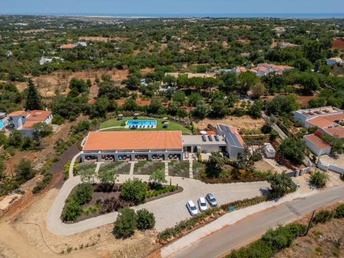 an overhead view of a building with a us sign in front at Apartment Suites Sunny Hill-1 by Interhome in Murtais