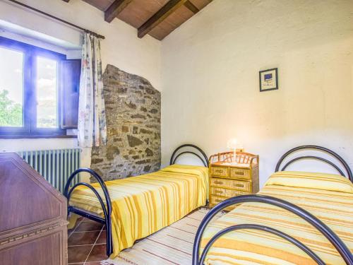 Ένα ή περισσότερα κρεβάτια σε δωμάτιο στο Holiday Home La Terrazza Rosata by Interhome