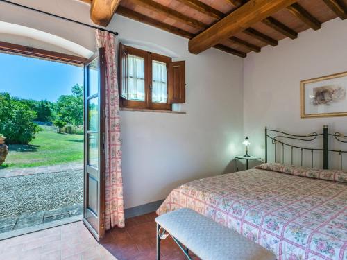 Postel nebo postele na pokoji v ubytování Holiday Home Podere San Giuseppe-2 by Interhome