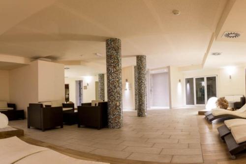 Posezení v ubytování Appartement Letizia mit Sauna by MoniCare