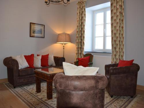 Χώρος καθιστικού στο Charming Farmhouse in Ouffet for 7