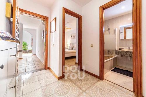 a view of a kitchen with a door leading into a room at Apartment Fairways Club in San Miguel de Abona