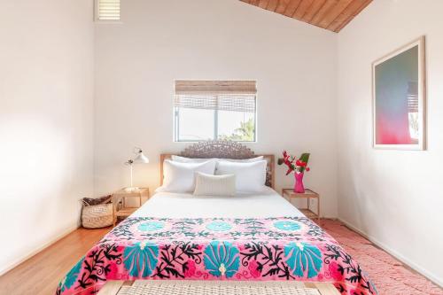 Letto o letti in una camera di Casa Grateful Hawaii