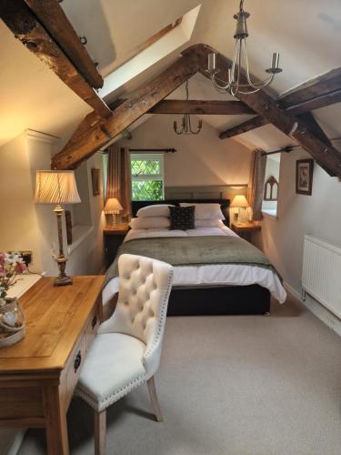 Voodi või voodid majutusasutuse The Stables Cottage at Glyn Isa toas