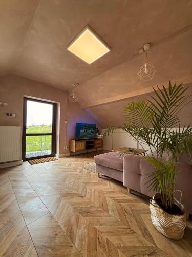 TV a/nebo společenská místnost v ubytování Apartament pod miastem