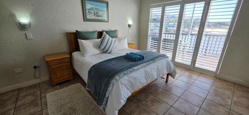 Postel nebo postele na pokoji v ubytování Inn on the Sea 4-Sleeps 8-On Ramsgate main beach!