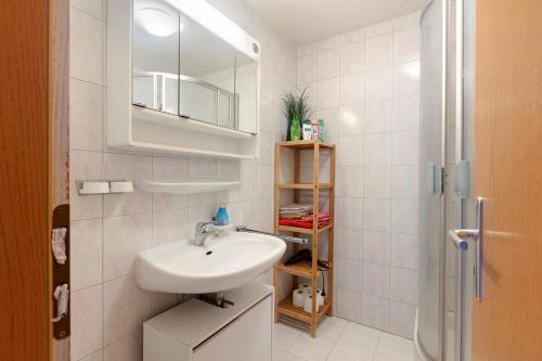 Ένα μπάνιο στο Ferienwohnung Tetto Piccolo