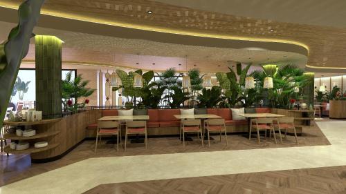 En restaurant eller et andet spisested på Radisson Resort & Residences Tenerife - Adults Only