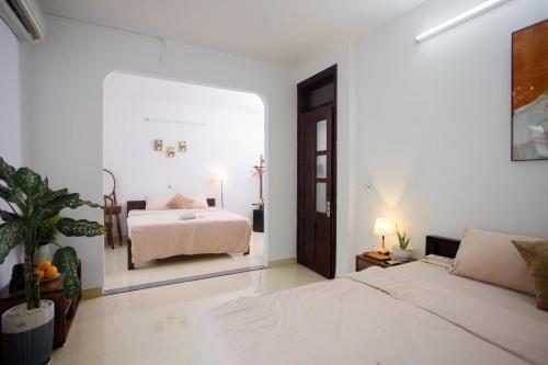 Postel nebo postele na pokoji v ubytování Green home, Huế