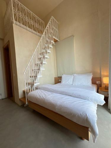 Cama o camas de una habitación en Neoli