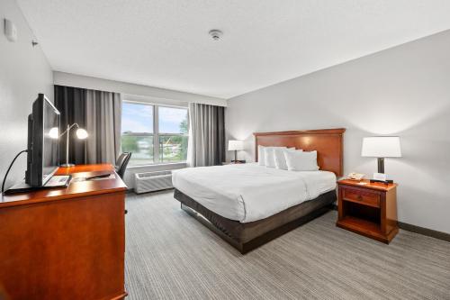 Katil atau katil-katil dalam bilik di Independence Stay Hotel & Suites