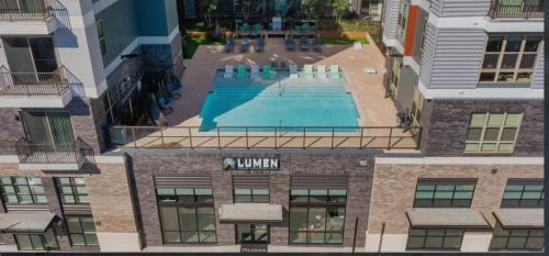 an overhead view of a pool on top of a building at Live at Lumen in Birmingham